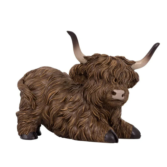 HIGHLAND COW SITTING